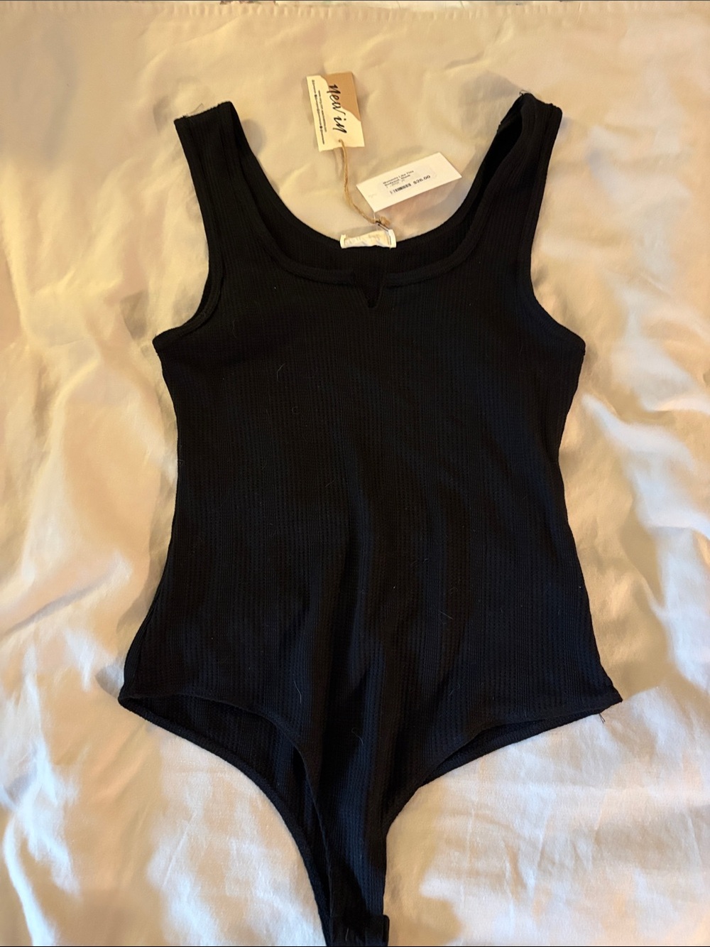 Black Ribbed One-Piece Bodysuit